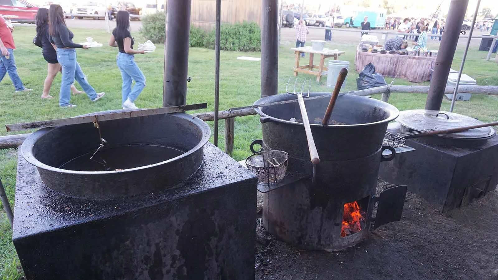 Matt David pulls Western cookout cuisine from cauldrons of beef tallow at the Green River Rendezvous.