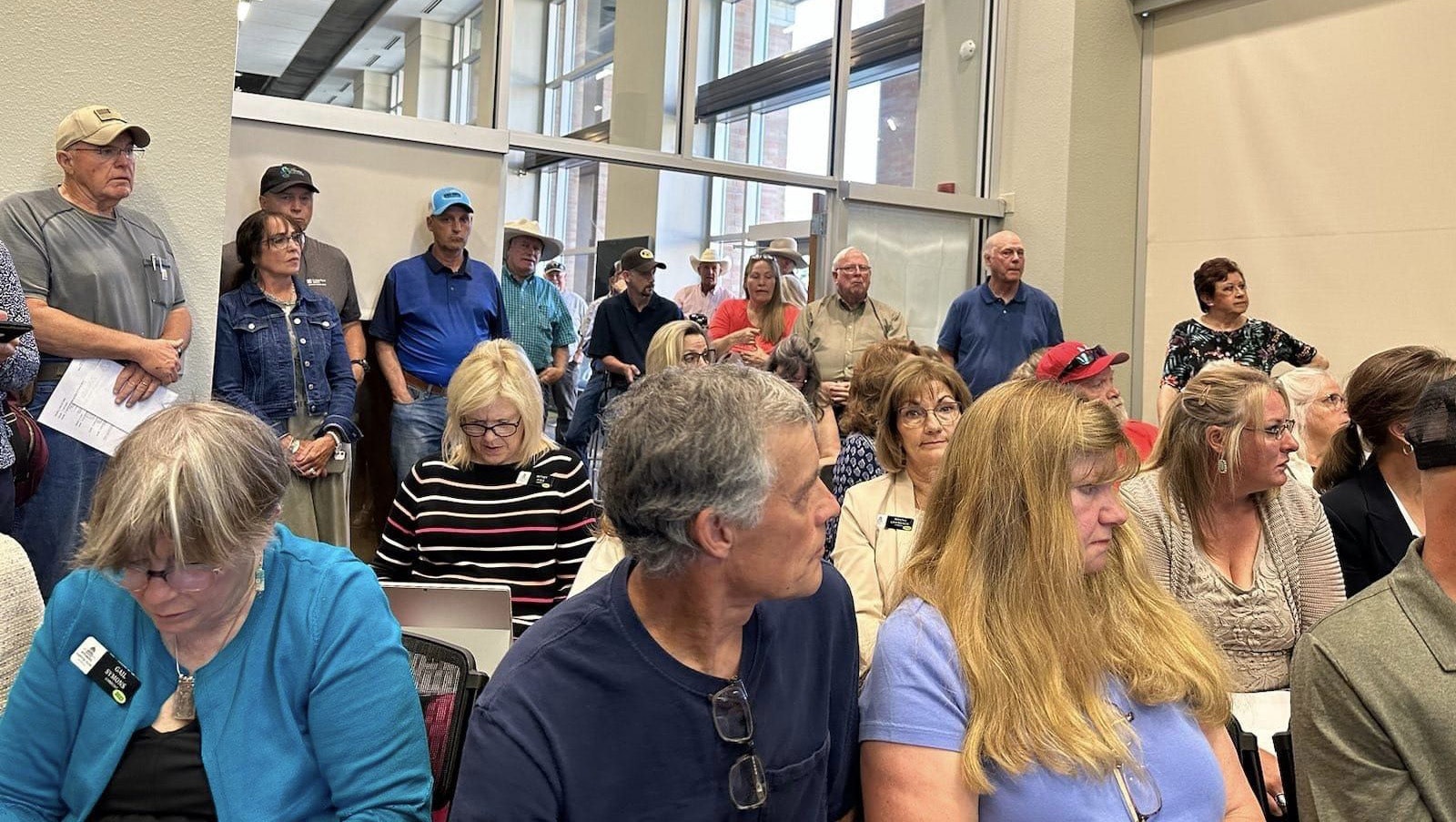Wyoming residents pack a meeting room at Sheridan College on June 26 to tell lawmakers what they think about soaring property tax rates.