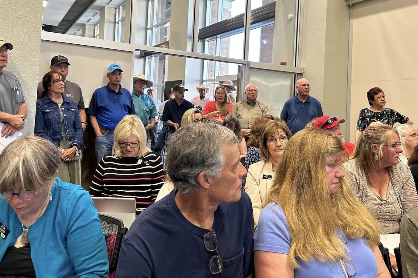 Wyoming residents pack a meeting room at Sheridan College on June 26 to tell lawmakers what they think about soaring property tax rates.