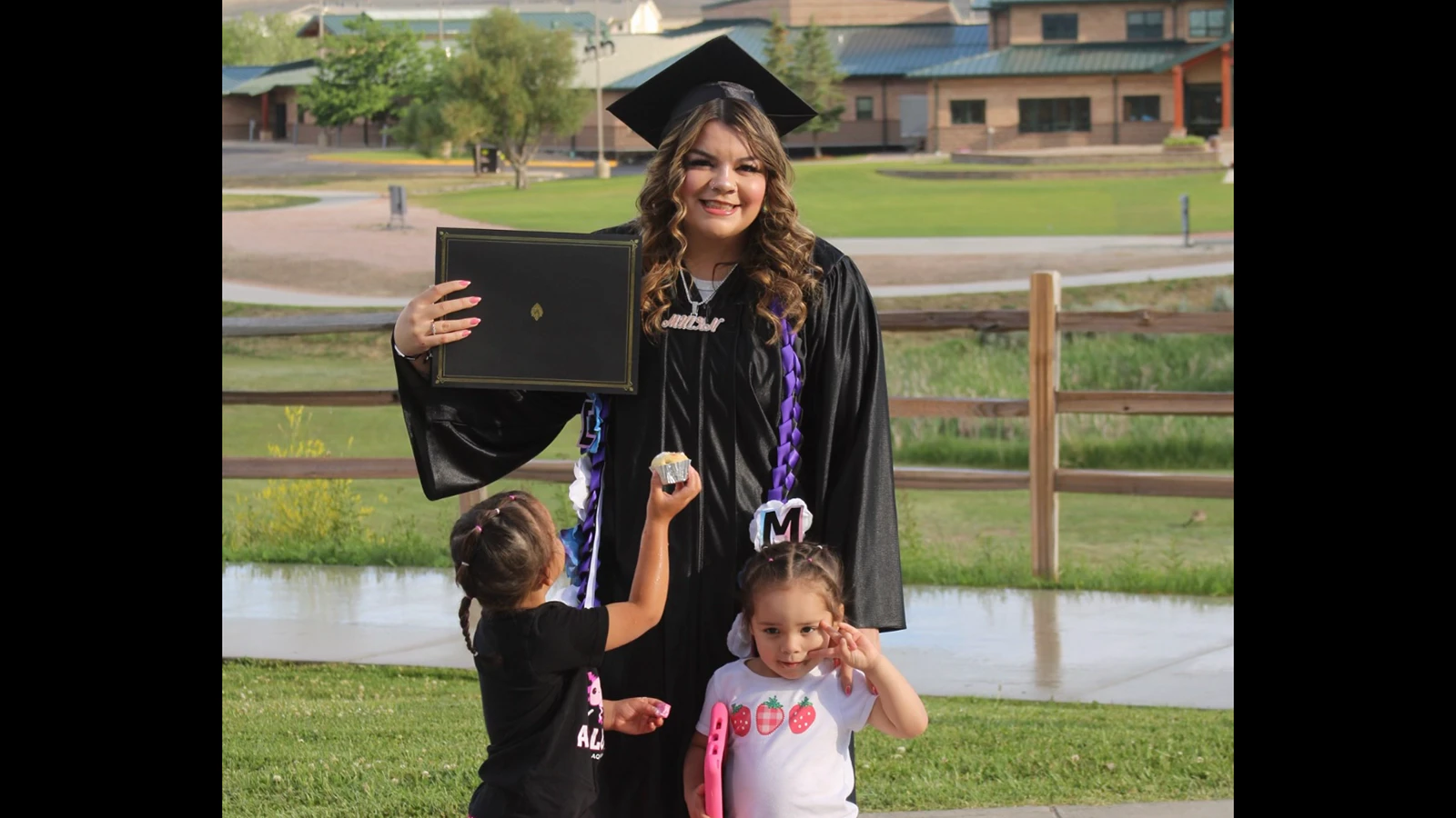 Milanii Engavo Sojos graduated with a Certified Nurse's Assistant license this spring. Her two daughters, Riverlynn (4) and Royalty (3) were there to celebrate with her.