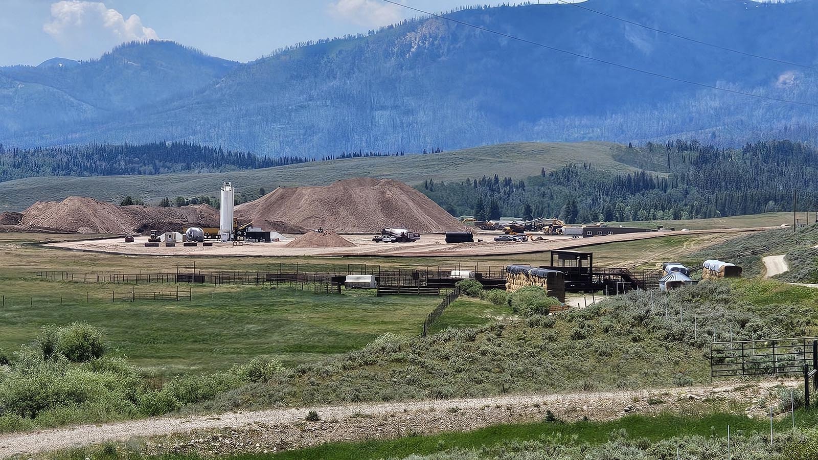 The white tower in this photo is part of a batch plant that was to make concrete on site for a posh, 250,000-square-foot resort planned by Joe Ricketts.