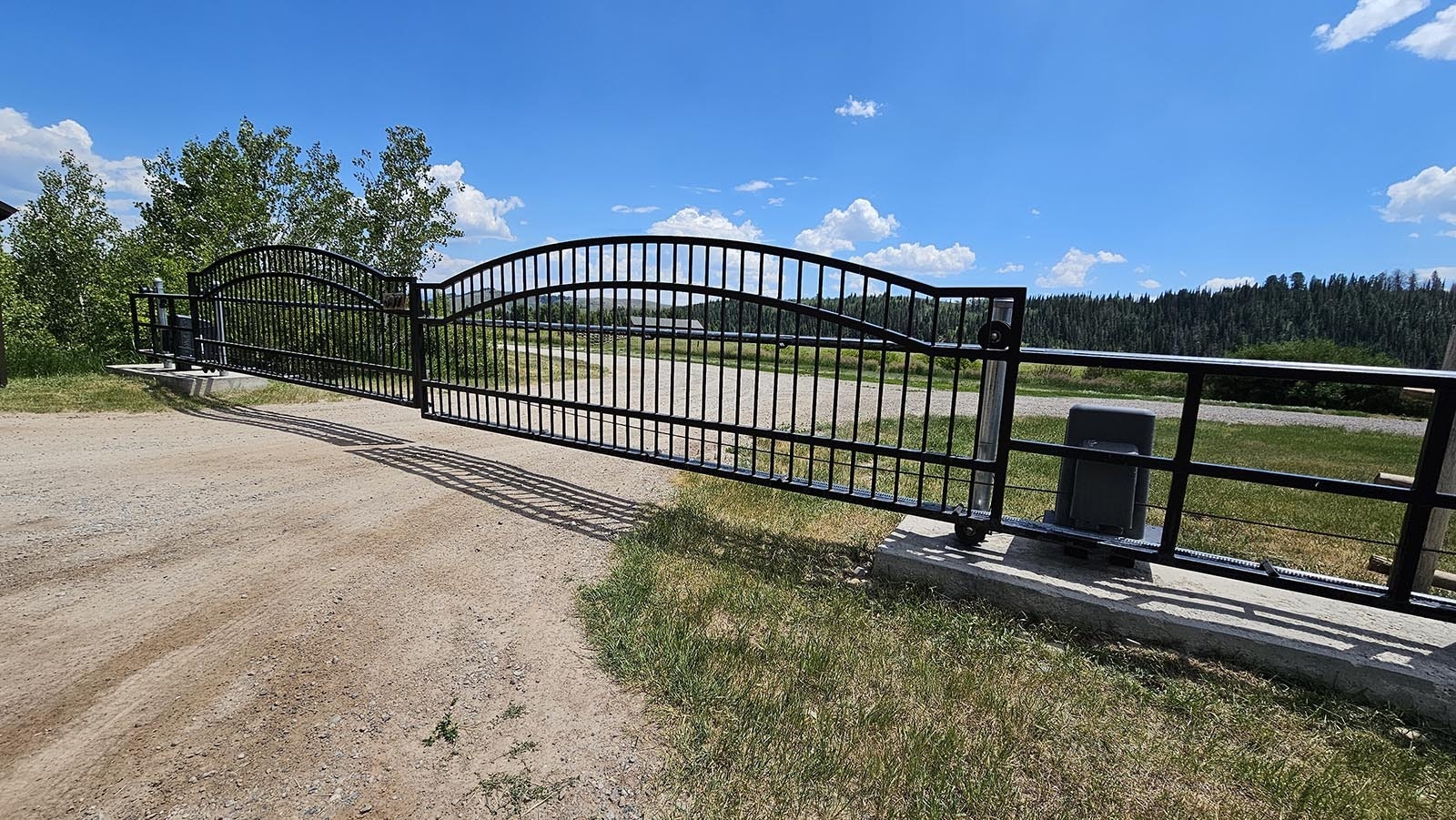 The gates to Joe Ricketts' ranch, which lies in the midst of a 150-mile-long elk and moose migration corridor between the Red Desert and the Hoback River Basin.