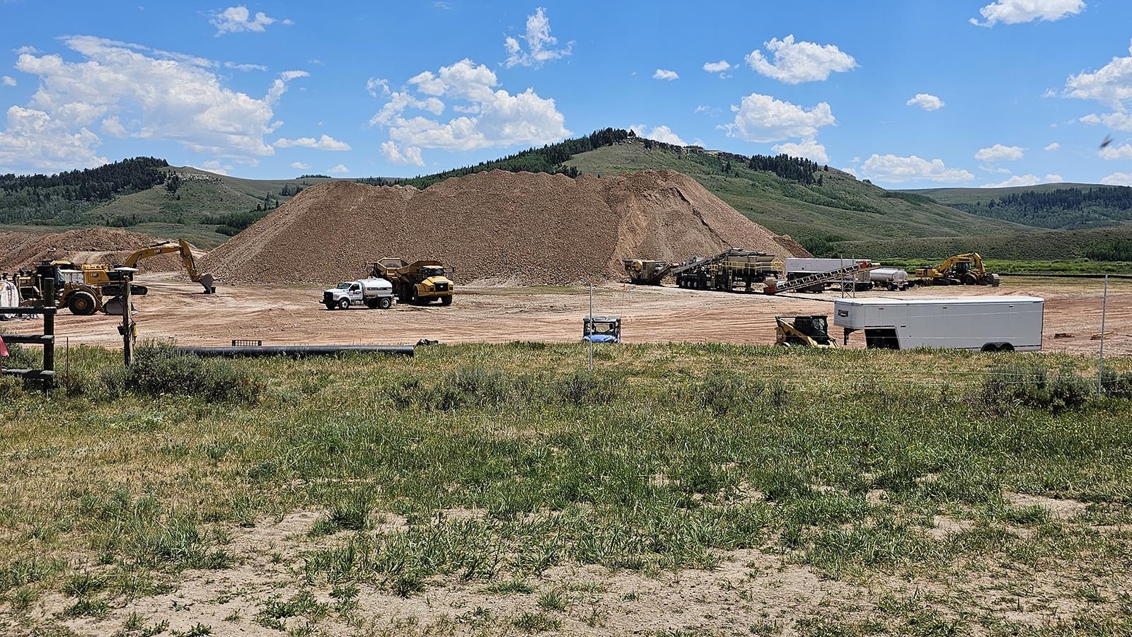 A literal mountain of dirt still remains at the project site for a posh 250,000-square-foot resort.