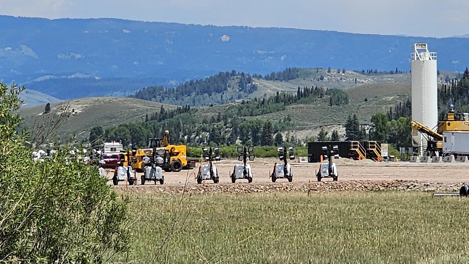 A line of huge construction lights awaits loading at a project site for the 250,000-square-foot resort Joe Ricketts had planned to build in the valley along Upper Hoback River Road.