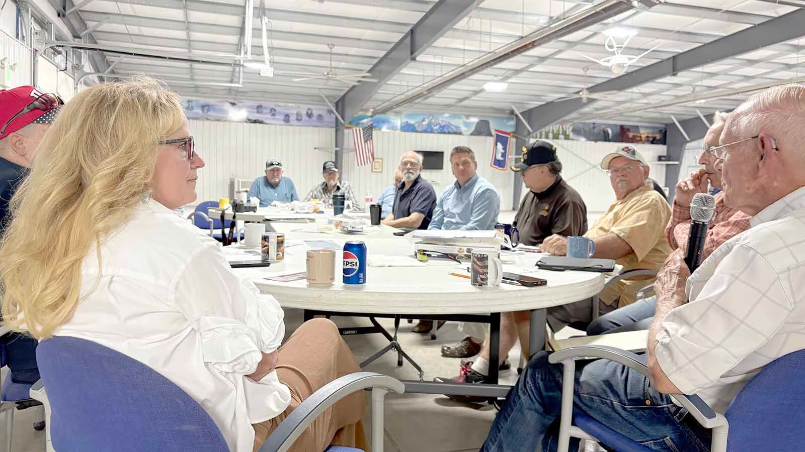 Former Wyoming Superintendent of Public Instruction and current U.S. House candidate Jillian Balow, left, meets with "The Gentry" in Riverton on Wednesday.