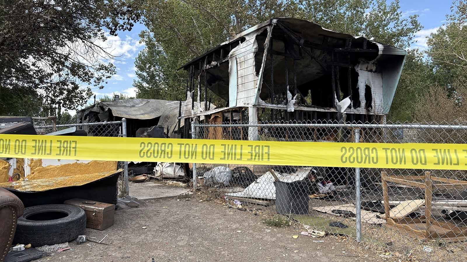 Authorities are investigating a fire that destroyed a trailer house north of Riverton on Friday evening. A 43-year-old woman was found dead in the ruins. 