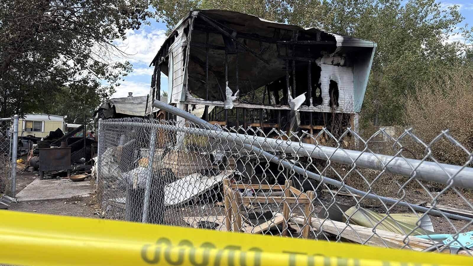 Authorities are investigating a fire that destroyed a trailer house north of Riverton on Friday evening. A 43-year-old woman was found dead in the ruins. 