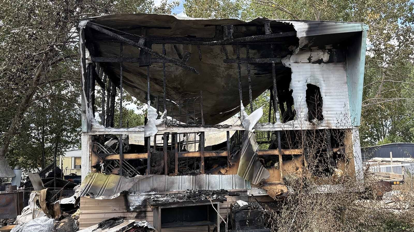 Authorities are investigating a fire that destroyed a trailer house north of Riverton on Friday evening. A 43-year-old woman was found dead in the ruins. 