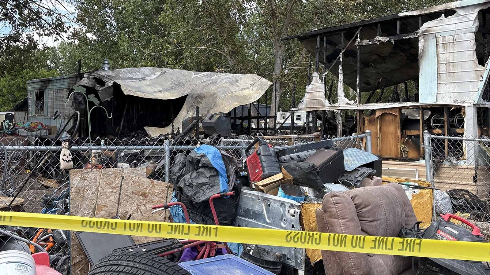 Authorities are investigating a fire that destroyed a trailer house north of Riverton on Friday evening. A 43-year-old woman was found dead in the ruins. 