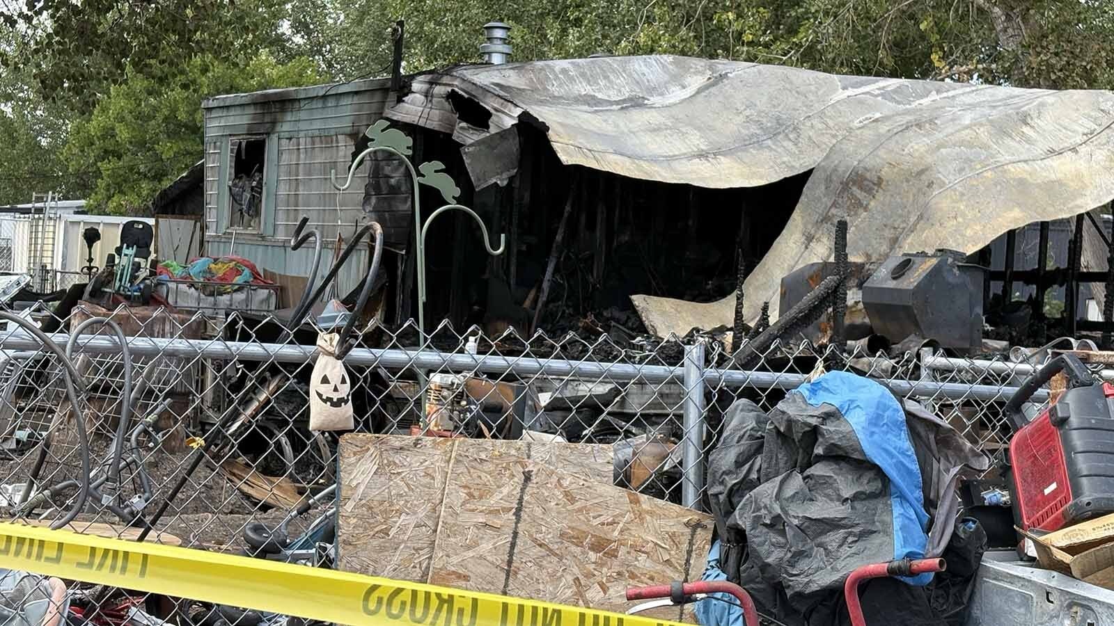 Authorities are investigating a fire that destroyed a trailer house north of Riverton on Friday evening. A 43-year-old woman was found dead in the ruins. 