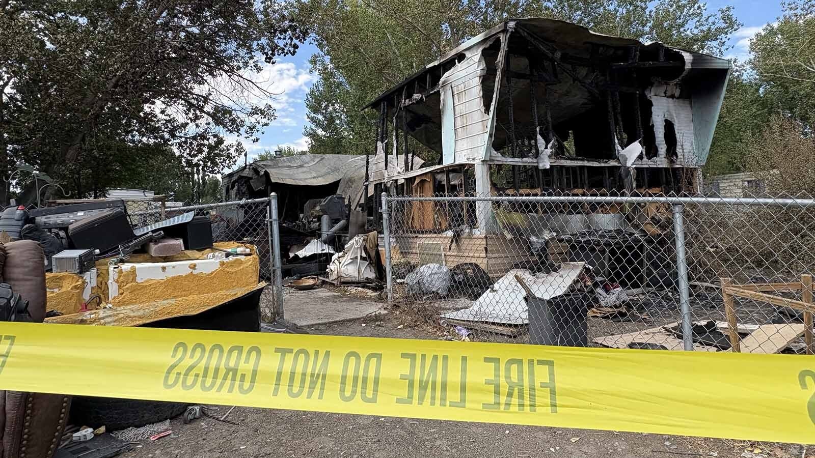 Authorities are investigating a fire that destroyed a trailer house north of Riverton on Friday evening. A 43-year-old woman was found dead in the ruins.