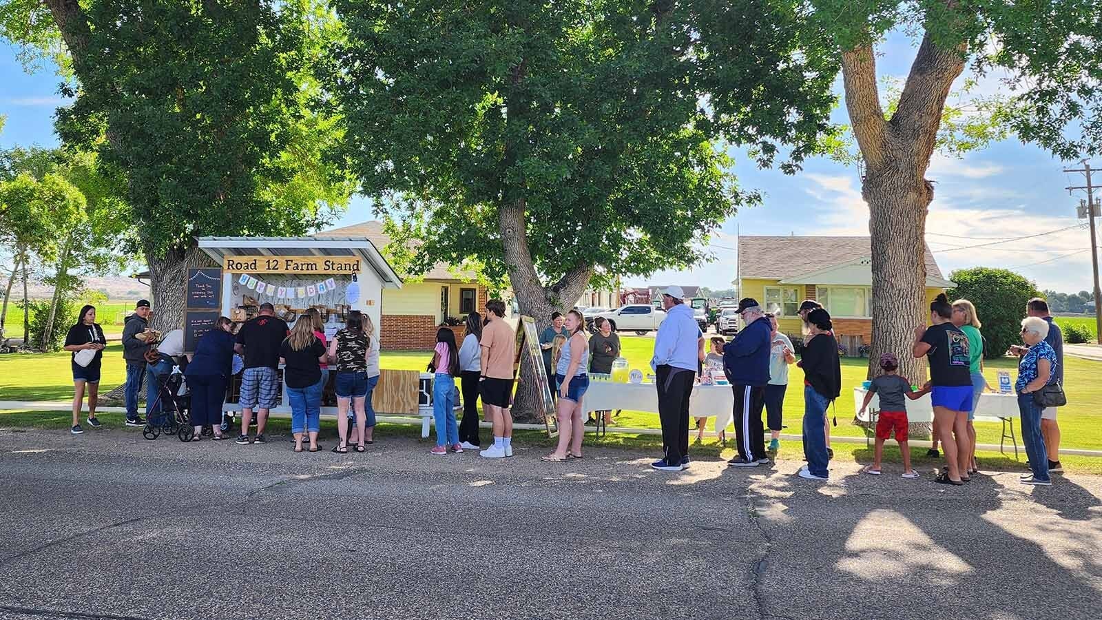 Customers arrive early at the Road 12 Farm Stand outside Worland to get the best selection of baked goods for the week.