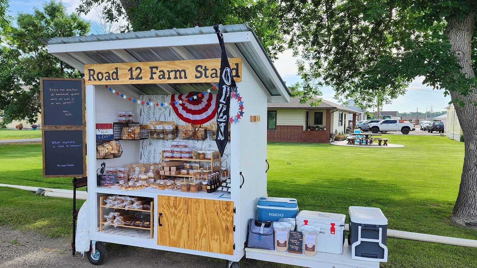 The Road 12 Farm Stand earlier this season as the garden plants continued to grow offered a selection of baked goods.