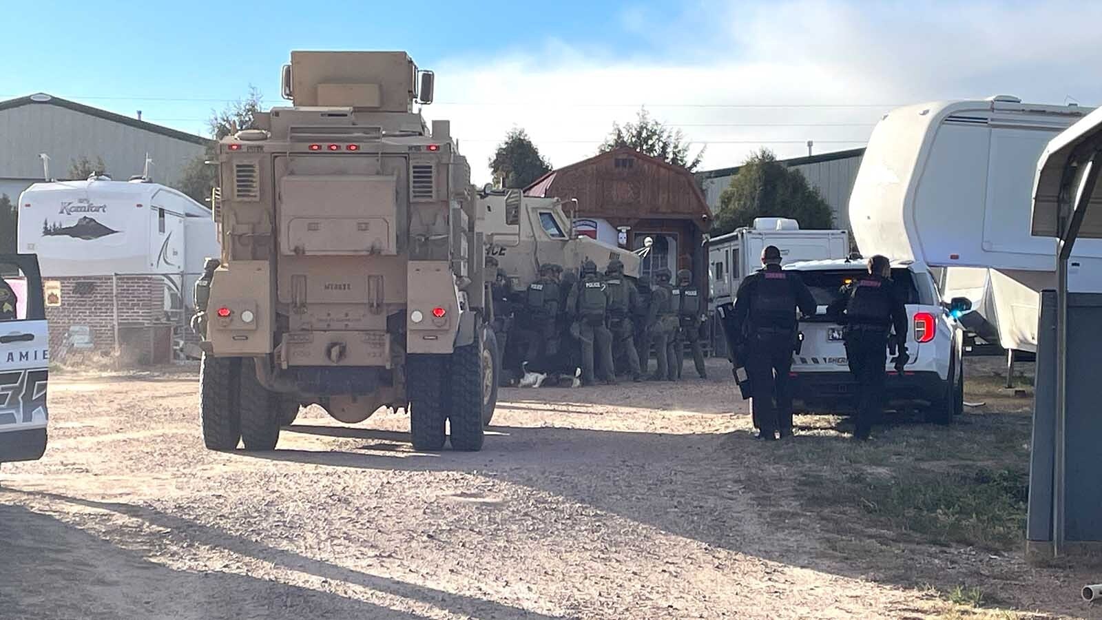 Cheyenne residents are debating the level of a joint police-sheriff’s office SWAT response Monday to a man barricaded in a building armed with a knife. Some call it extreme while others say they’re glad to be protected.