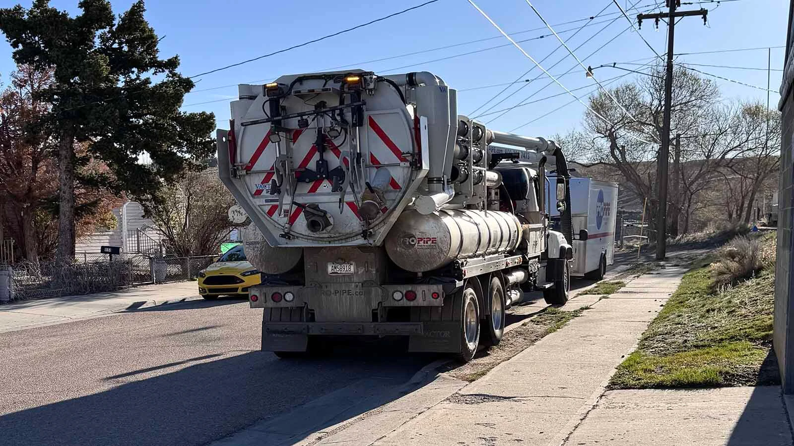 Heavy equipment and cement trucks occupy the narrow neighborhood streets in an older part of Rock Springs, leaving residents struggling to navigate around the construction.