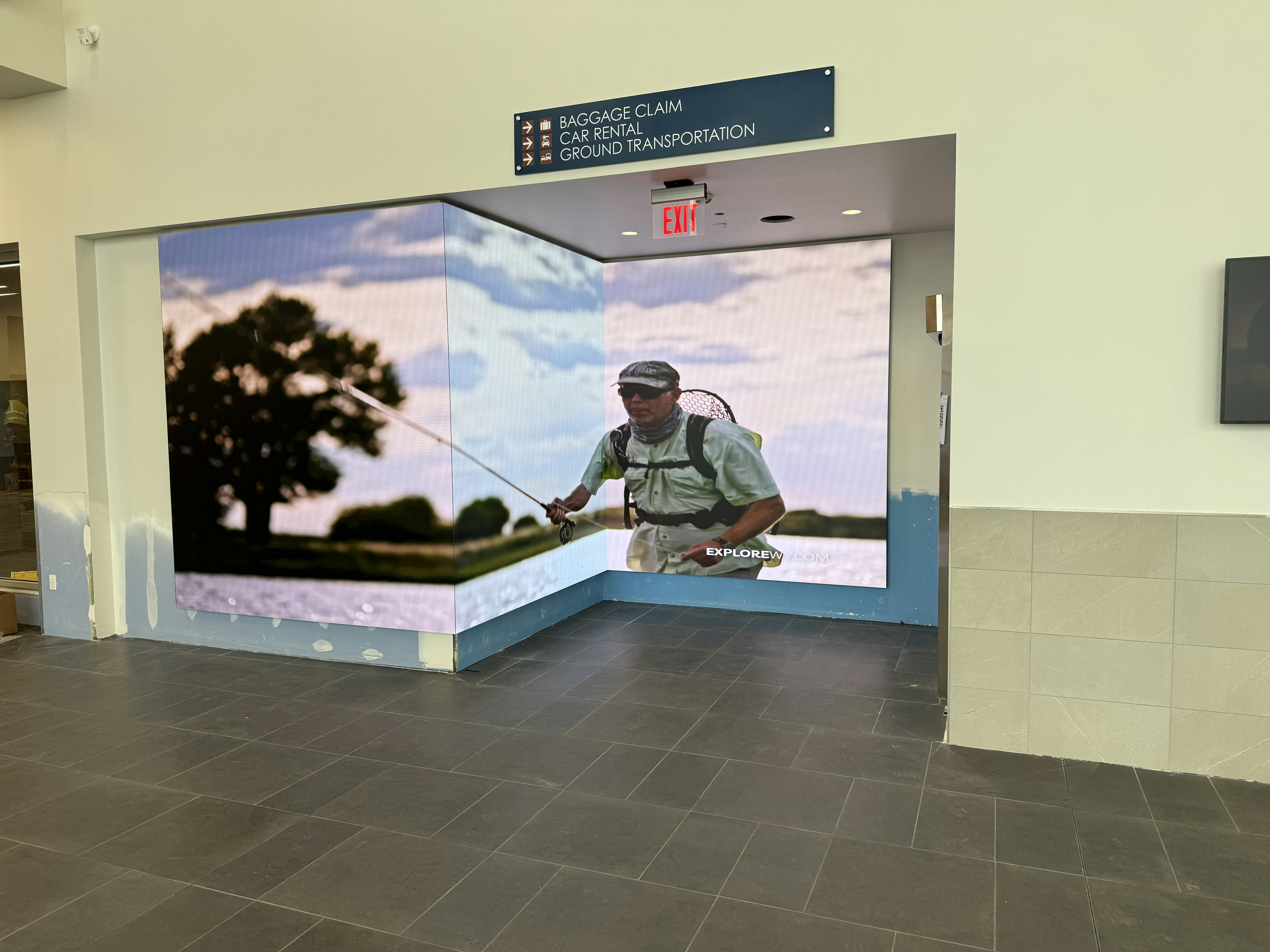 One of the unique features of the new Rock Springs Airport terminal is a wraparpound video board at the exit that can feature all kinds of messages and Wyoming landscapes.