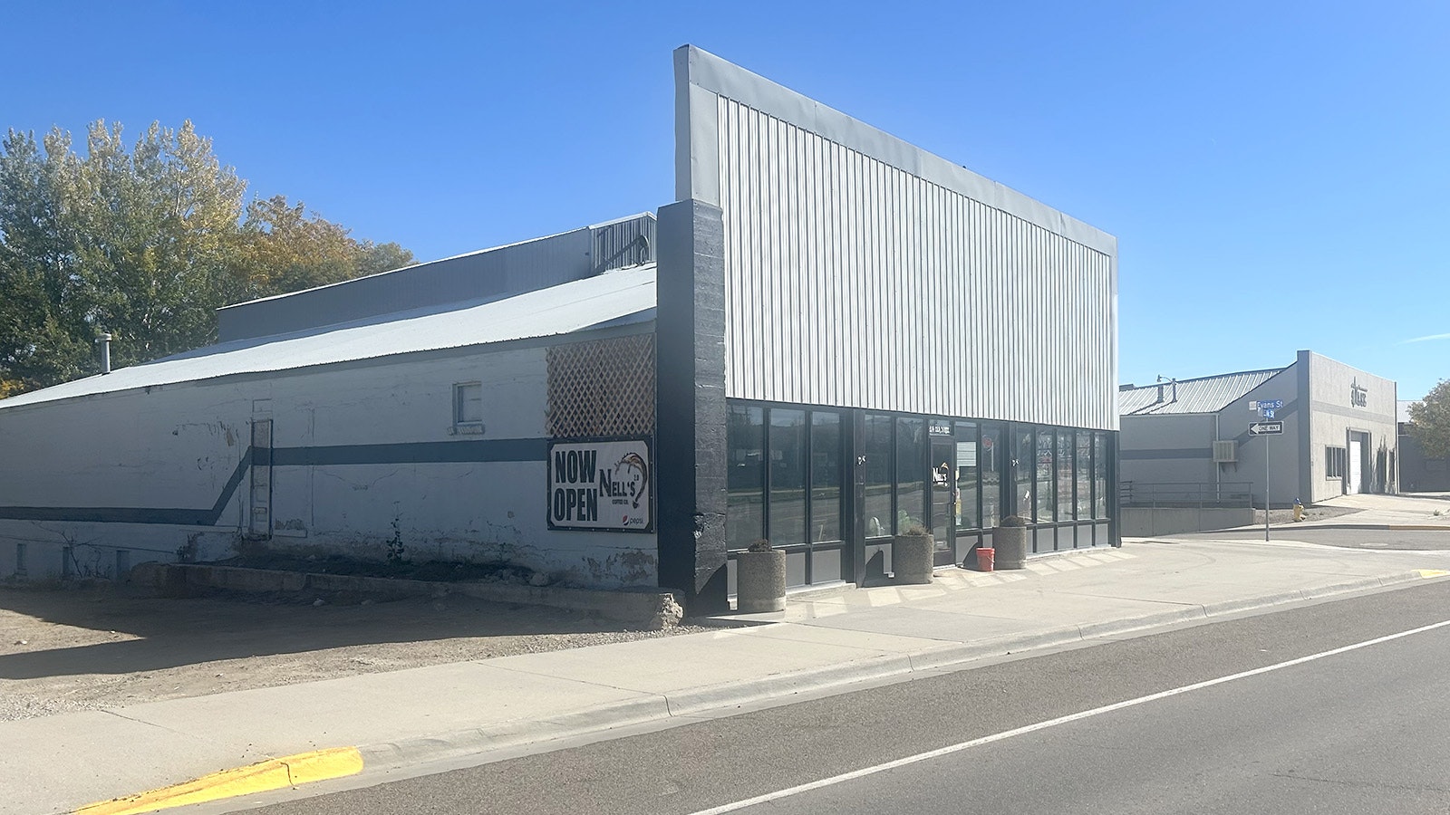 Nell's Coffee in Rock Springs had to close its first location after battling with the city over a building code that would've required $500,000 to comply with.