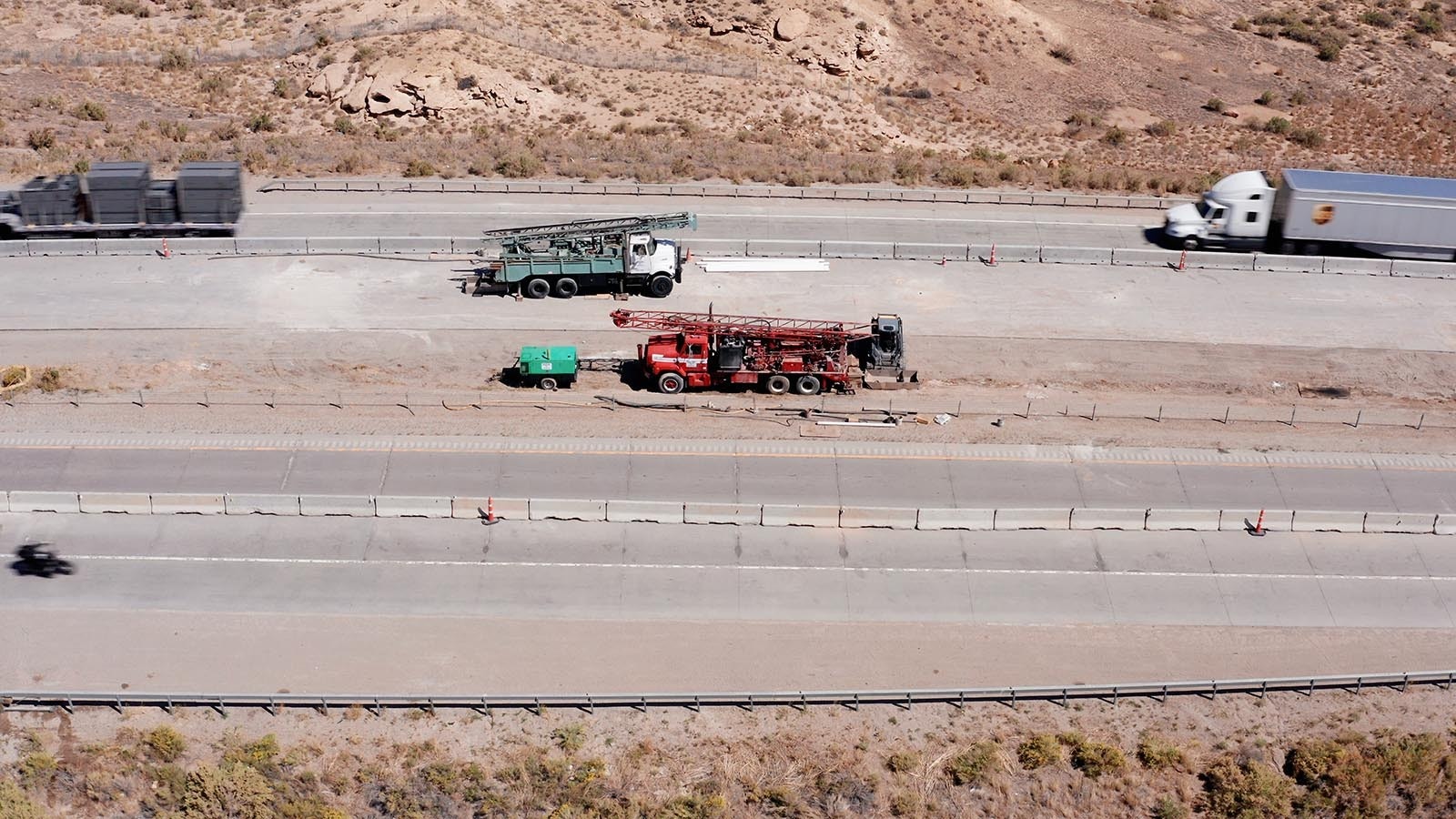 Work vehicles are pictured on Interstate 80 in Rock Springs, Wyoming. The Abandoned Mine Land Division was working to fill mine voids underneath the interstate until as recently as October 2024, when the project was completed.