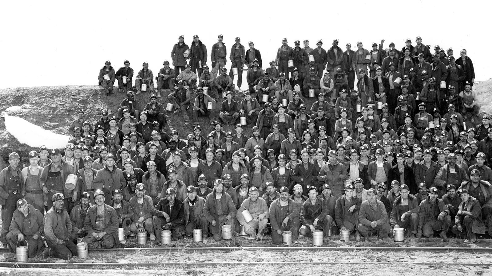 A group of miners from No. 7 mine pose for a photograph in Reliance, Wyoming, in 1951.