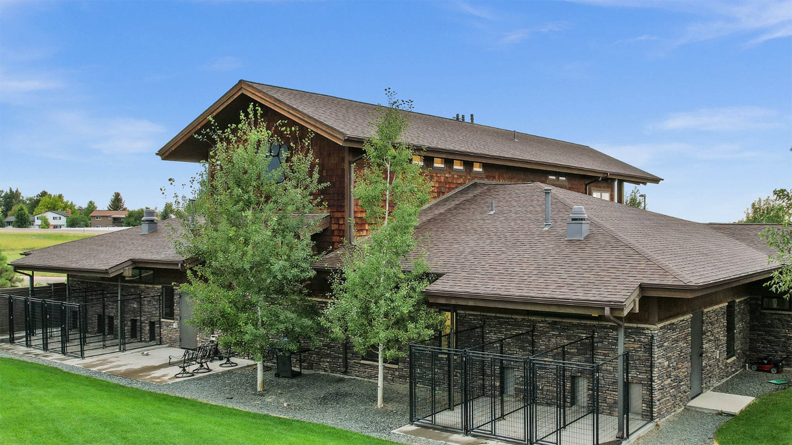 The rear of Rocky Mountain Animal Hospital features pens for animals that are boarding or being treated.