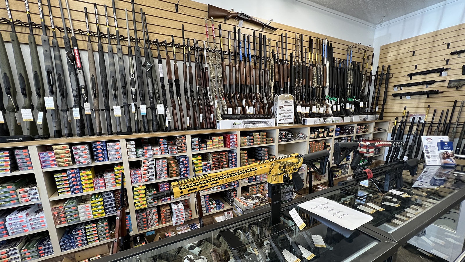 A collection of firearms for sale at Rocky Mountain Gun Trader in Cheyenne.