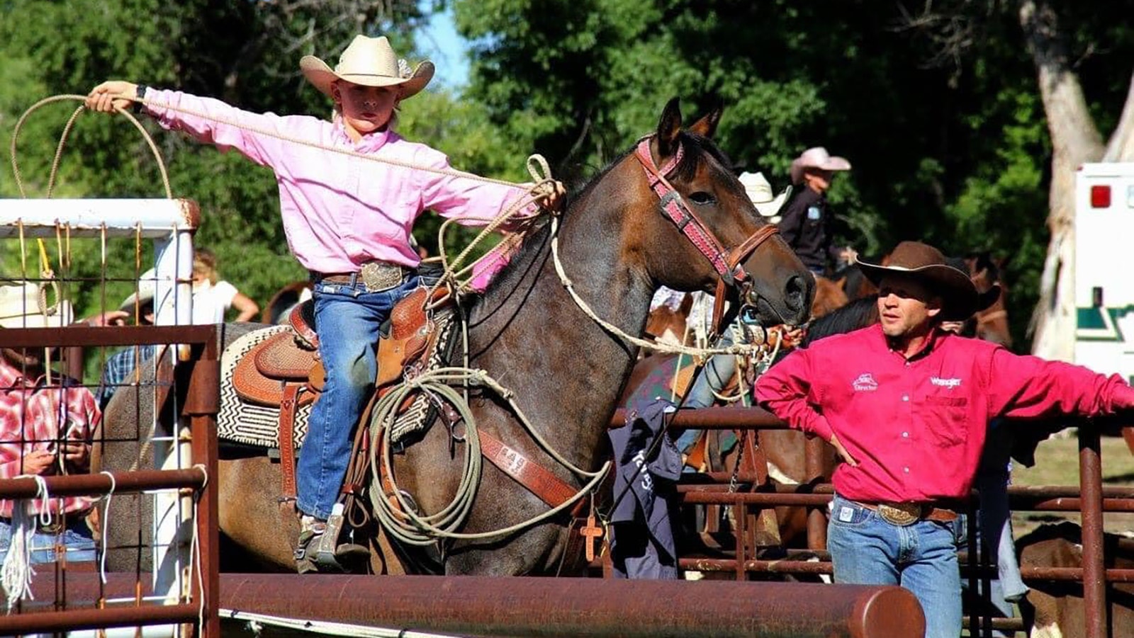 Roedy Farrell competing in the breakaway roping in 2017 with Will looking on.