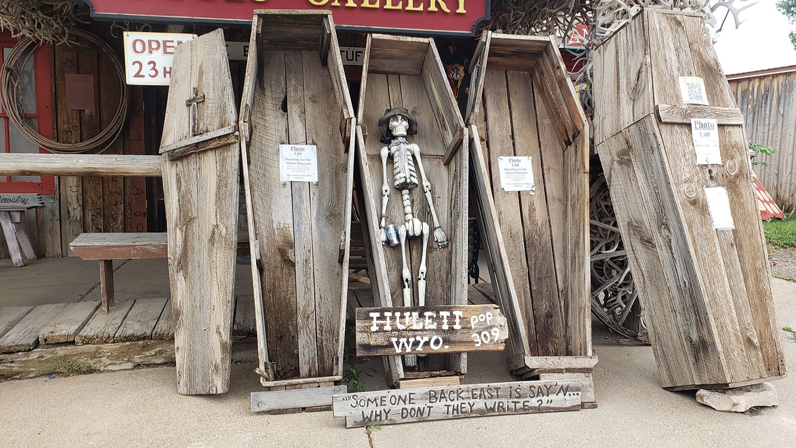 An arrangement of coffins offers tourists a photo opportunity for a donation.