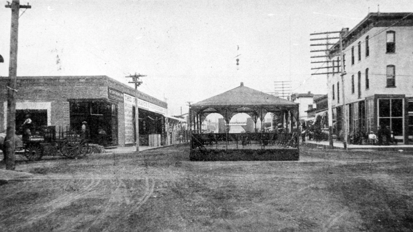 A bandstand at the intersection of Second and Center Street in downtown Casper in a photo taken from 1897 - 1911. At right is the Grand Central Hotel which was mentioned as part of the 1899 Roman candle war in downtown Casper.