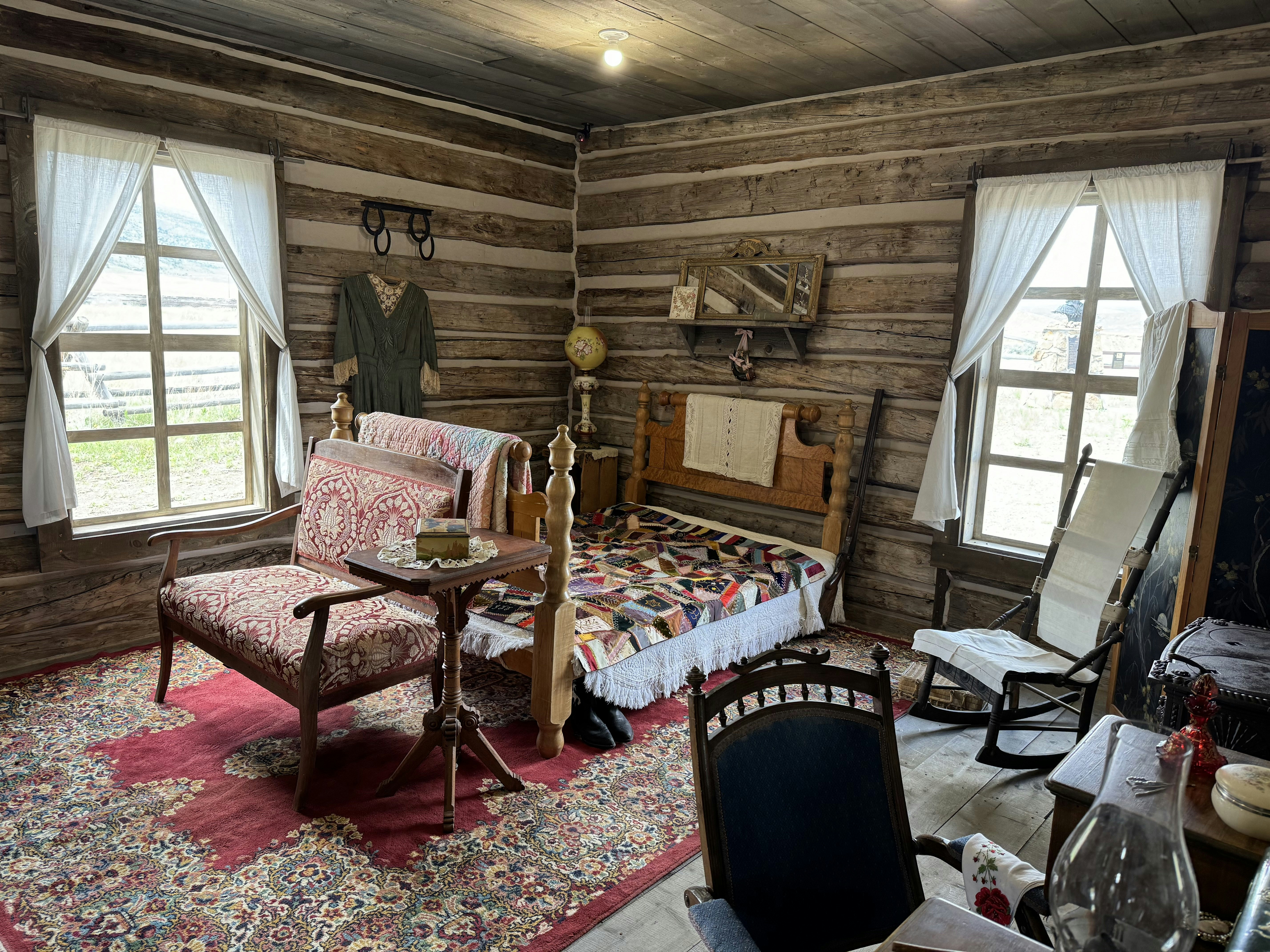 Rose Williams' personal bedroom at her roadhouse and brothel. All the furnishings are authentic to the 1890s. The structure itself was rediscovered near Meeteetse in 2019 and meticulously disassembled, reassembled, and restored at Old Trail Town between 2021 and 2024.