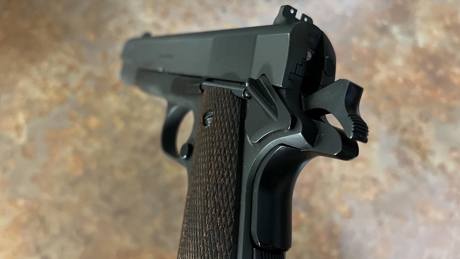 The popular 1911 pistol design features a thumb-activated safety switch that will keep the gun from firing until it’s flicked to the off position. There is also a lever on the back of the grip that must also be fully depressed by the shooter’s palm before the pistol will fire. Fans of the 1911 say those features make it especially safe for carrying with a round in the firing chamber.