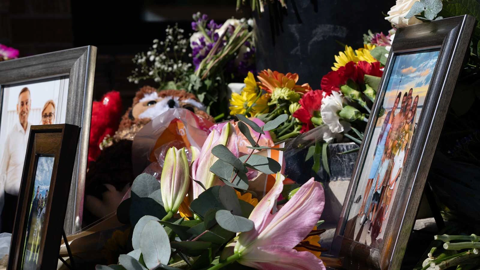 Dozens of Kate Gladdin's friends and community members held a memorial for Julie Fitzsimon's in downtown Sheridan on the corner where days earlier she was struck and killed by a distracted driver on May 28, 2025. 