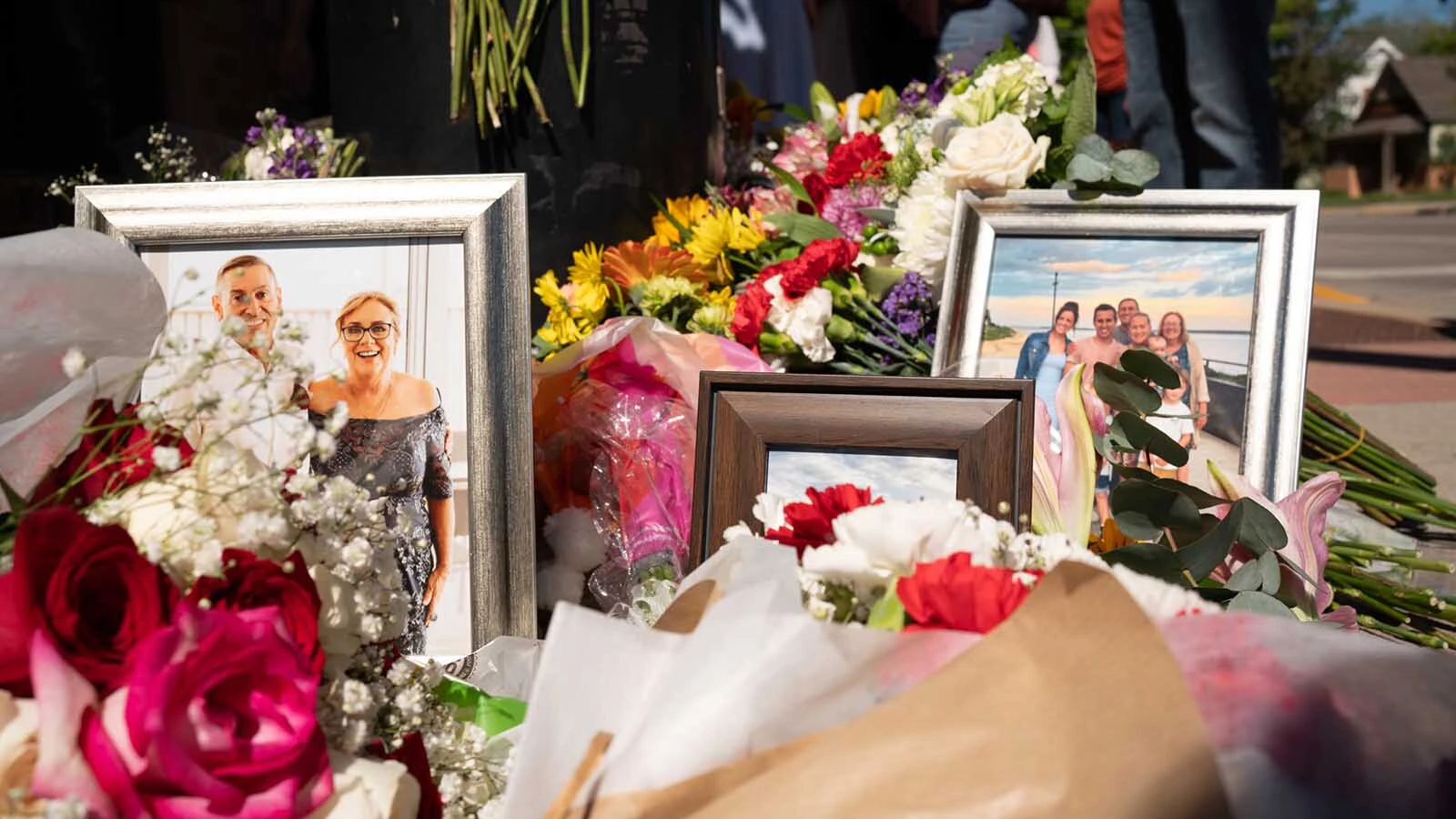 Dozens of Kate Gladdin's friends and community members held a memorial for Julie Fitzsimon's in downtown Sheridan on the corner where days earlier she was struck and killed by a distracted driver on May 28, 2025. 