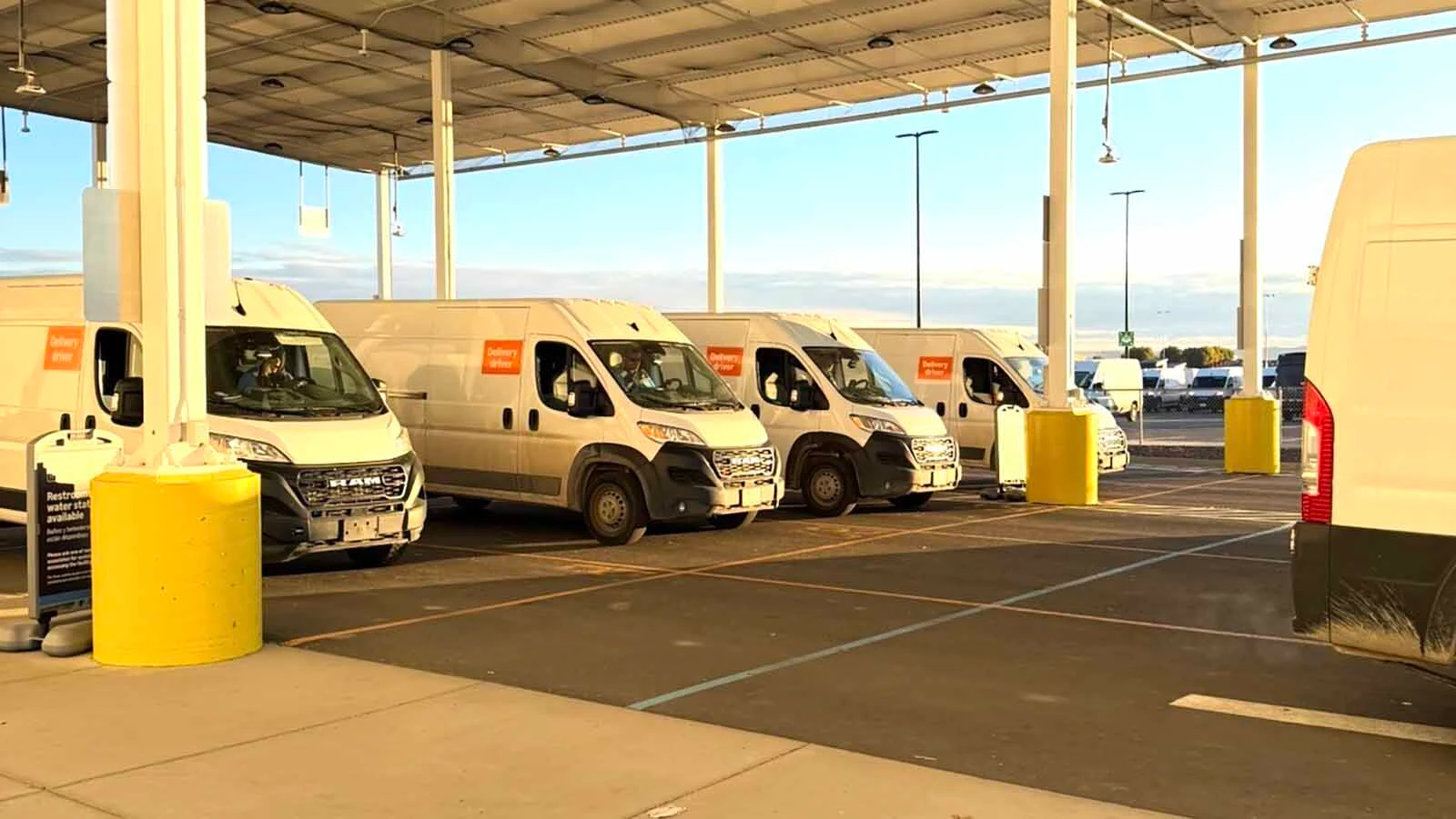 Vans for Righteous Routes Logistics which delivers for Amazon in Montana and Wyoming are lined up ready to go.