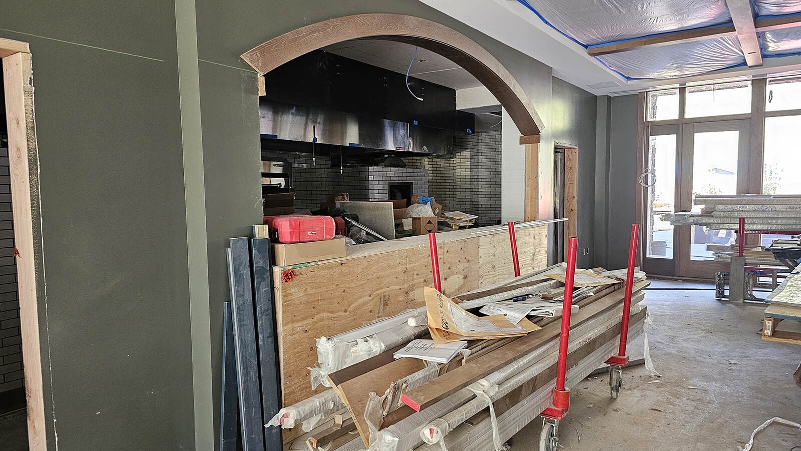 The kitchen will have a glass window so customers can see food being prepared.