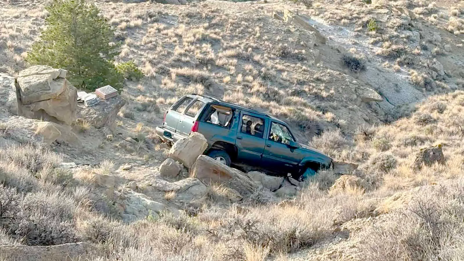 Two years ago, a GMC Yukon left U.S. 14-16-20 and bounced off giant boulders in Oregon Basin. It's still there and likely in its final resting place because recovering it would be "a fruitless effort," Zac Beardall of Zac's Towing and Recovery says.