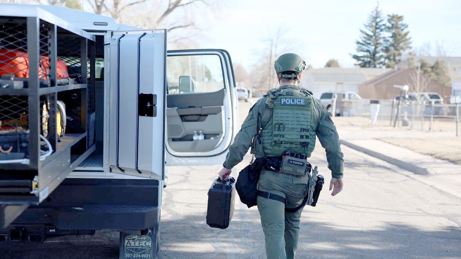 Cheyenne police used a fully armed SWAT team with an armored vehicle to breach a suspected drug house Thursday. One of two suspects arrested holed up in the home’s attic for two hours before finally giving up.