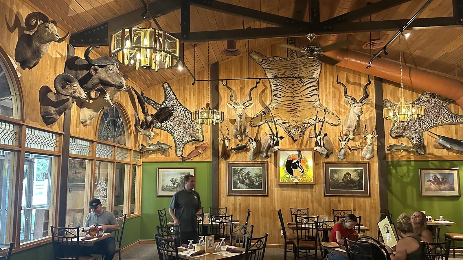 Dining beneath the world-class collection at the Safari Club in Thermopolis at the Hot Springs State Park.