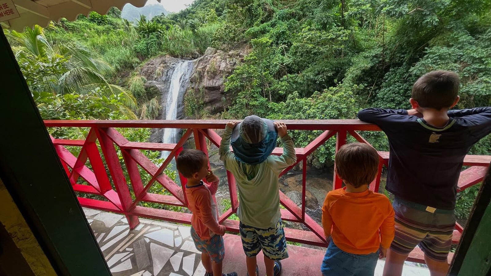 Aksel Schell, 5, and some friends look at the Concord Waterfall in Granada.