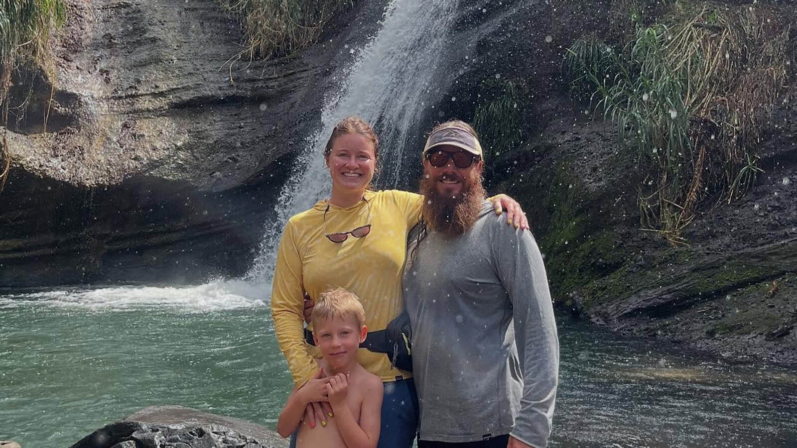 The Schell family of Wyoming poses in front of Concord Waterfall on the island of Granada. After that, they went to the Jouvay chocolate factory and then explored a forest reserve where wild Mona monkeys roam.