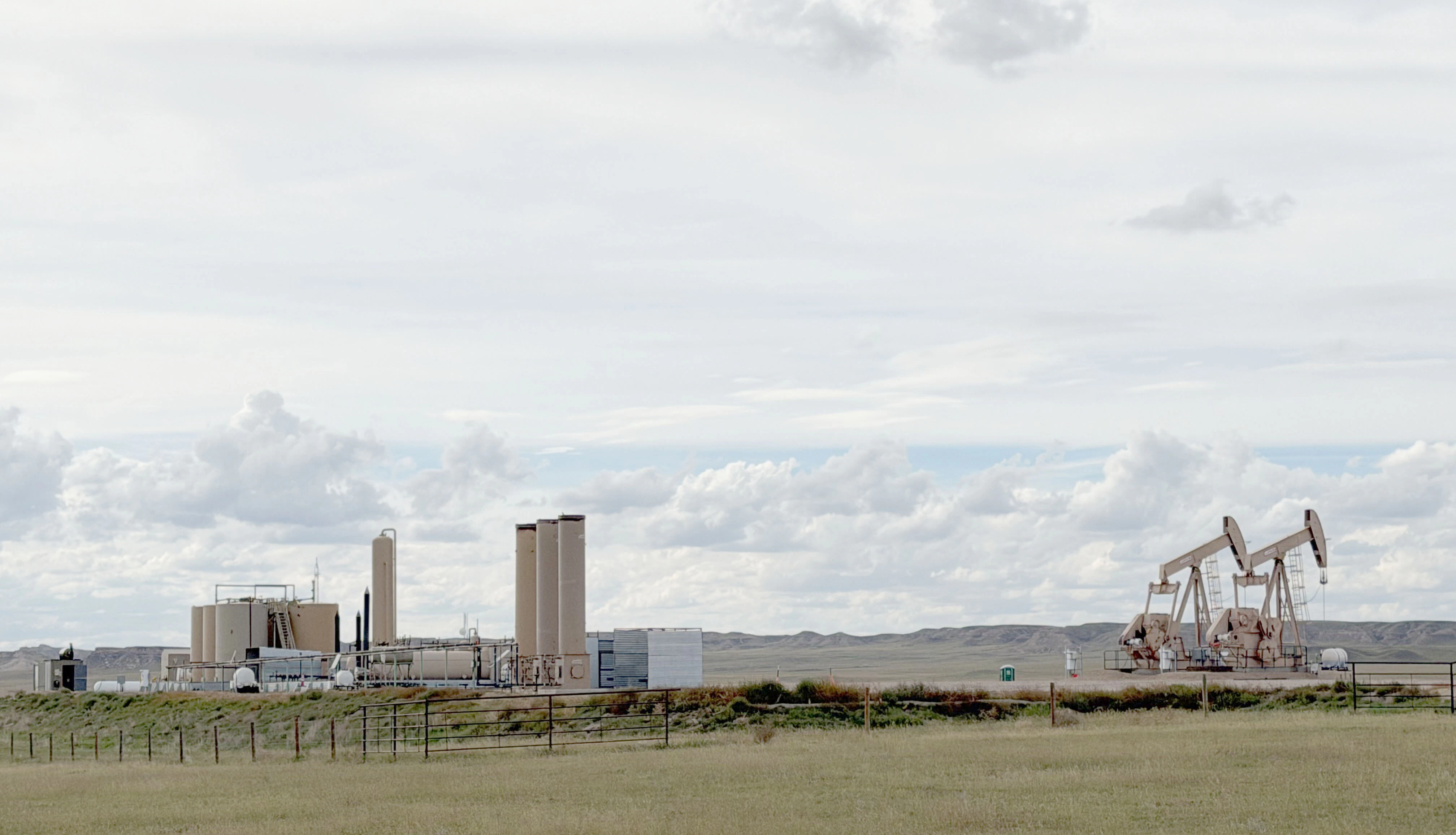 The Salo family sees oil pumpjacks and compressors from their home in Weld County. They've now been approved to have wind turbines.