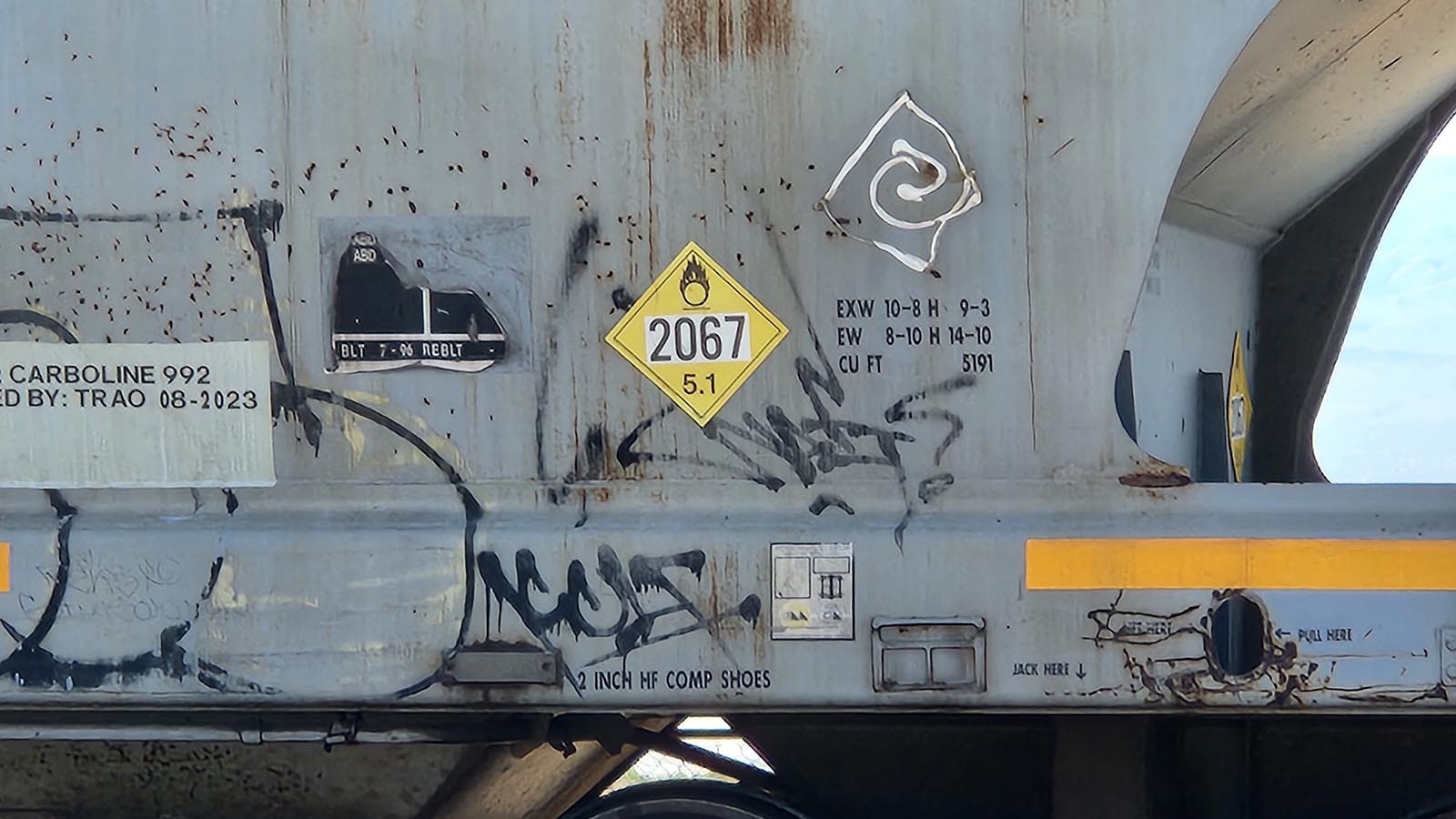 A label on the side of the hopper cars had the hazardous material placard of “UN 2067,” the identifier for ammonium nitrate. The hopper cars sitting in Saltdale on Monday indicated that they could each hold 5,191 cubic feet, or up to three times the 30 tons found missing last year.