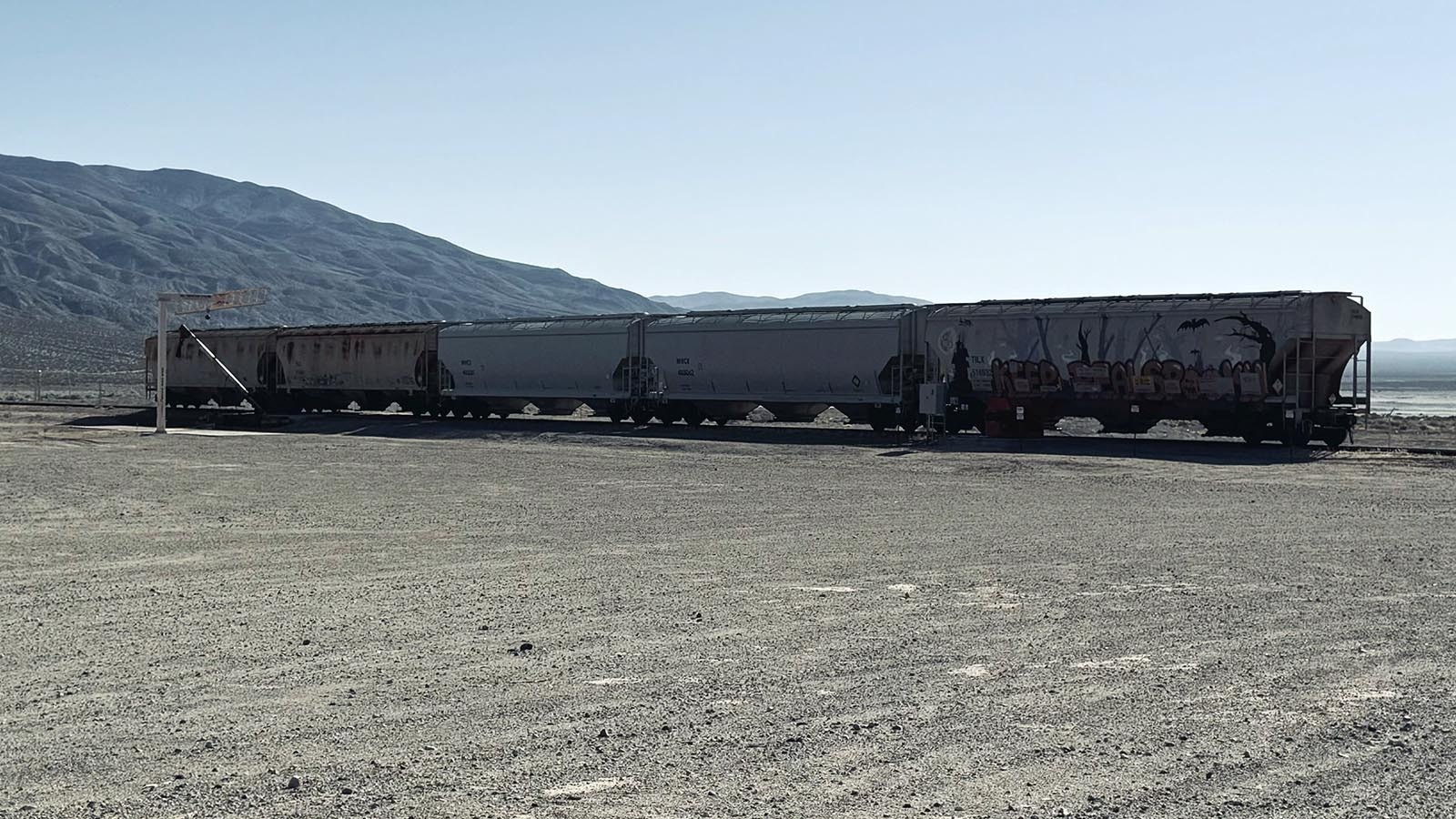 Hopper cars holding ammonium nitrate in Saltdale, California, in the Mojave Desert, where temperatures hit 100 on Monday.