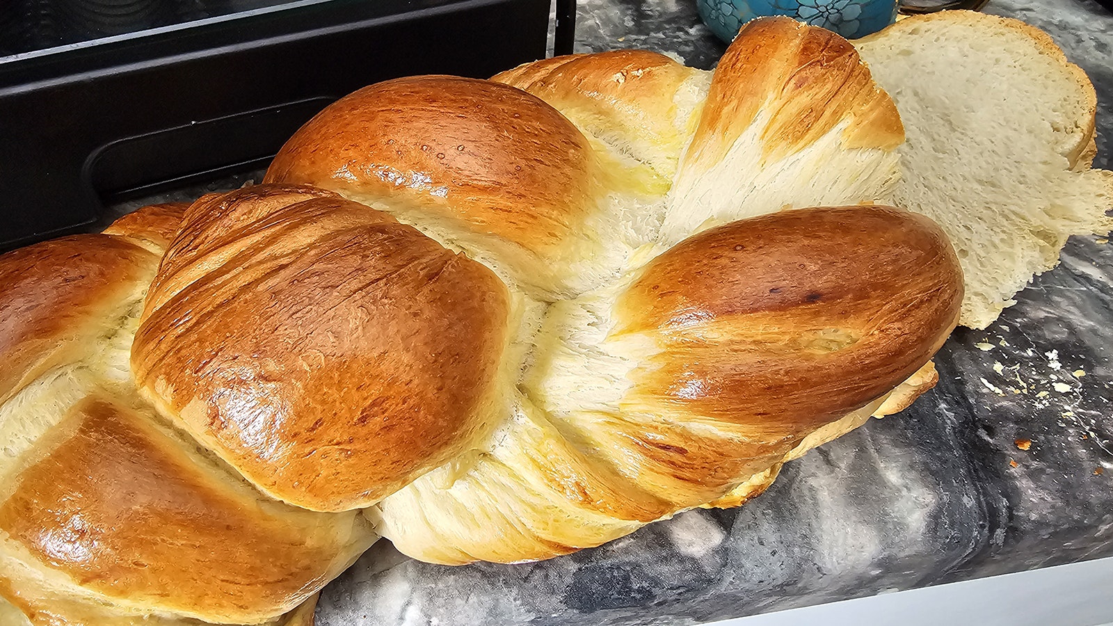 A loaf of finished butterzopf bread. Toasting each slice makes a great breakfast treat that goes well with a cup of coffee.