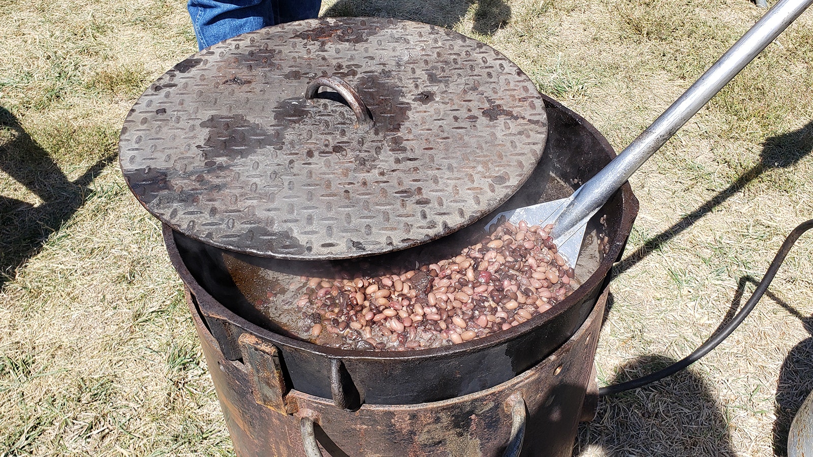 The magical pot of community beans has a different recipe every year based on whatever the cook pulls from the cupboard, or sometimes whatever the cook forgot to bring. This year's was smokey and salty with hint of bacon.