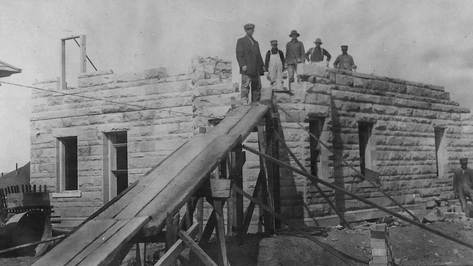 German immigrant and master stonemason John Schlacter spent five years building the castle by hand, hauling locally quarried stone through Rock Springs by horse and wagon before finishing the structure in 1914.