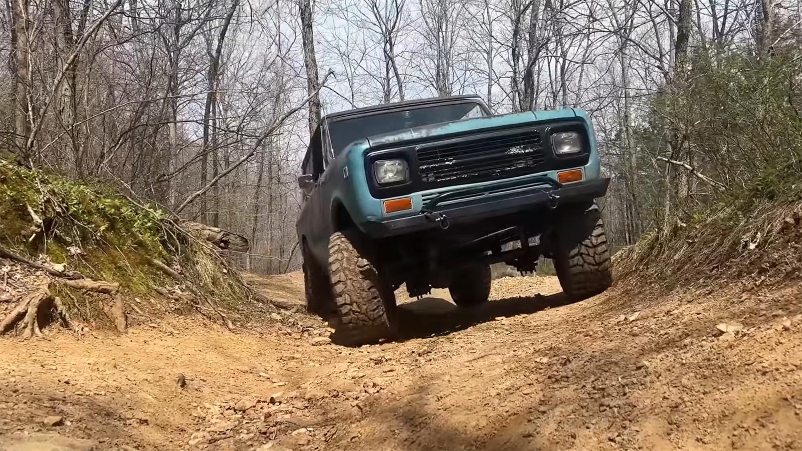 A turbo diesel Scout navigates off-road.