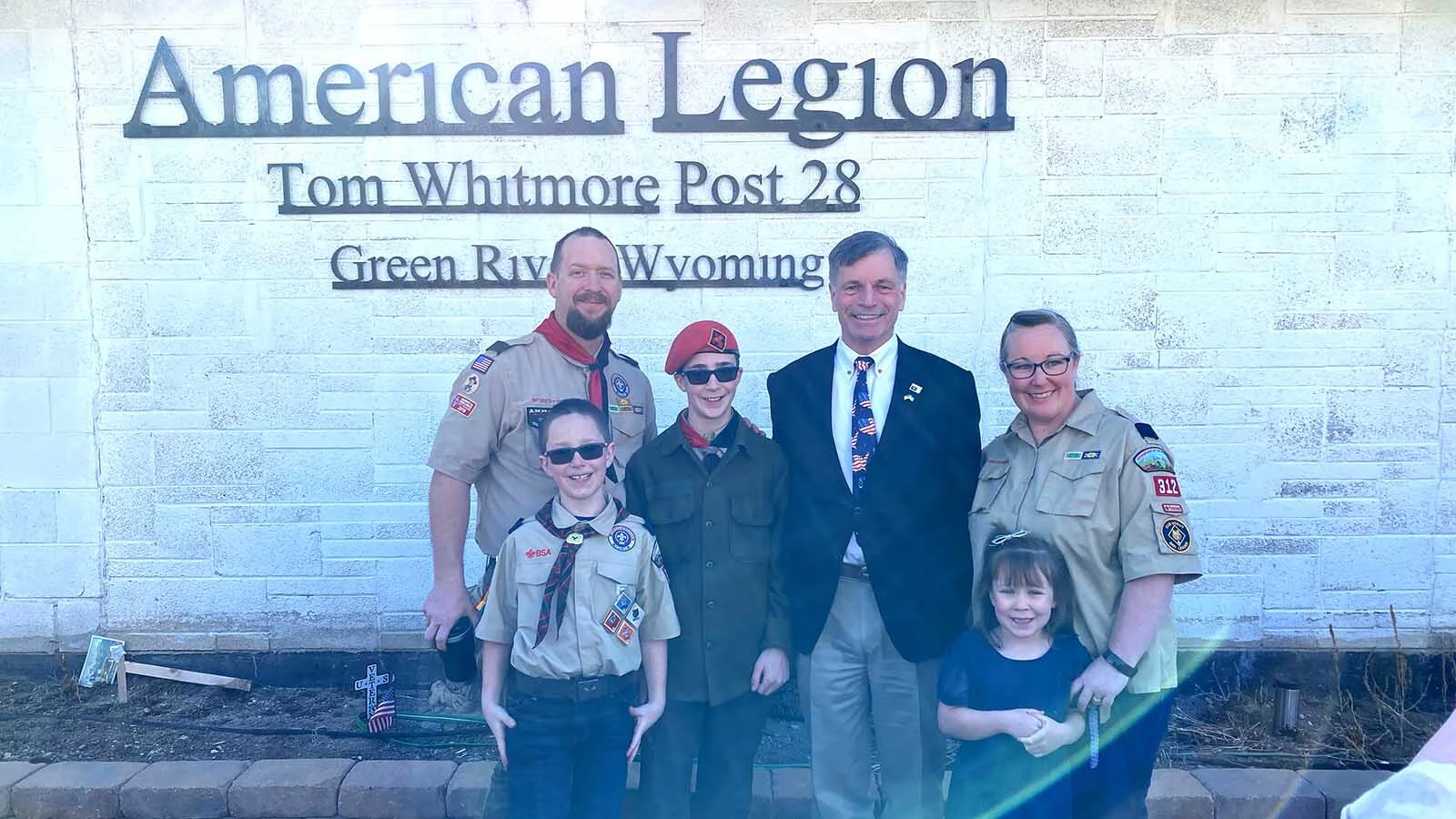 When a motorcyclist crashed through a fence into a Green River yard last summer, Hunter and Matt Rushing didn’t hesitate. Their Scouting training kicked in to render aid to the man, earning Hunter, an Eagle Scout, a special award of merit. Above, the family with Wyoming Gov. Mark Gordon.