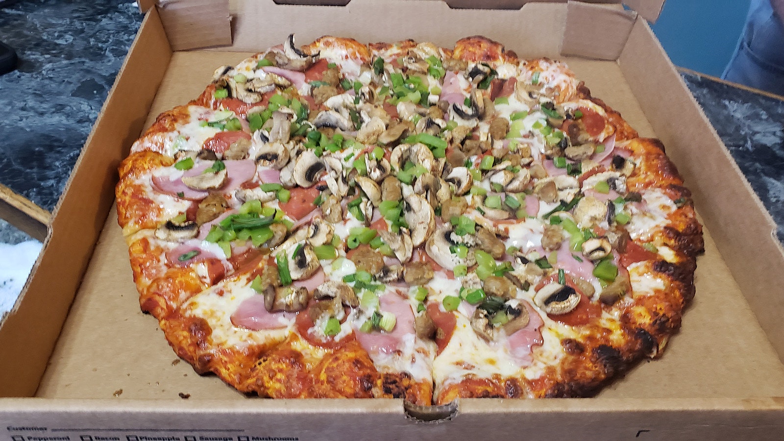 Scroungy Moose Pizza isnt skimpy with the toppings.