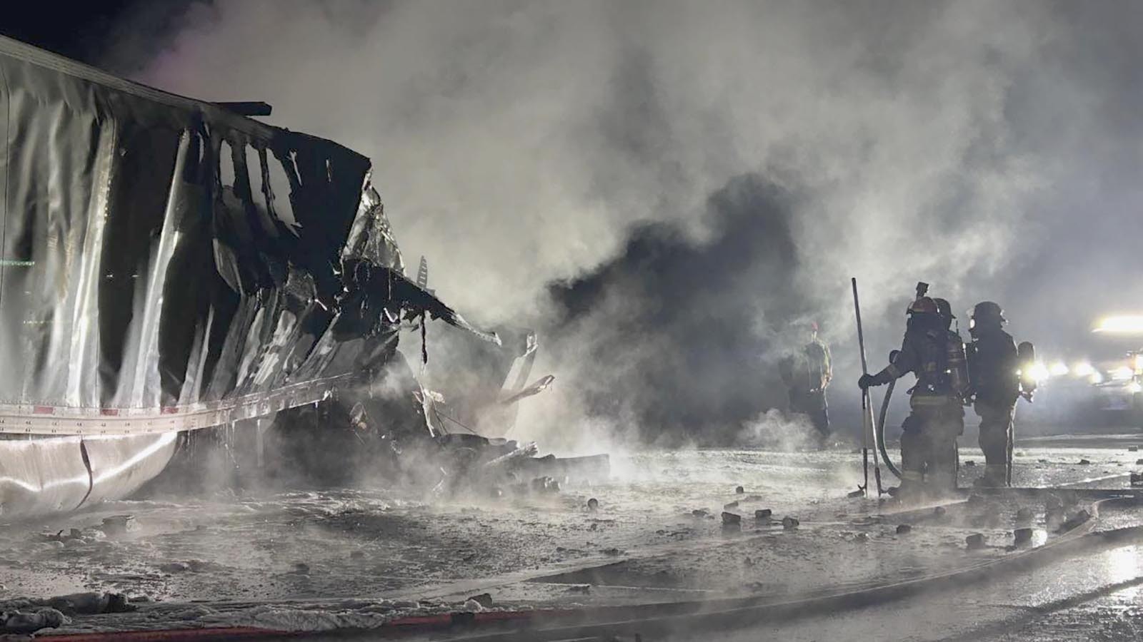 Two people are dead after their semitrailer exploded when it hit another semi that was parked illegally on the side of Interstate 80 near Green River on Sunday, Feb. 8, 2026. The crash “was a pretty bad one,” said one responder. “It was almost like a movie scene.”