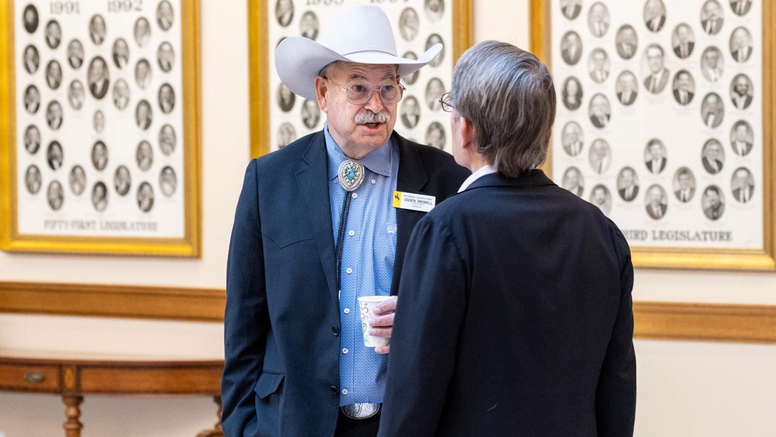 Sen Ogden Driskill talks in hall of Capitol